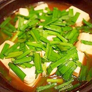 タジン鍋で♪　赤からスープで豆腐蒸し